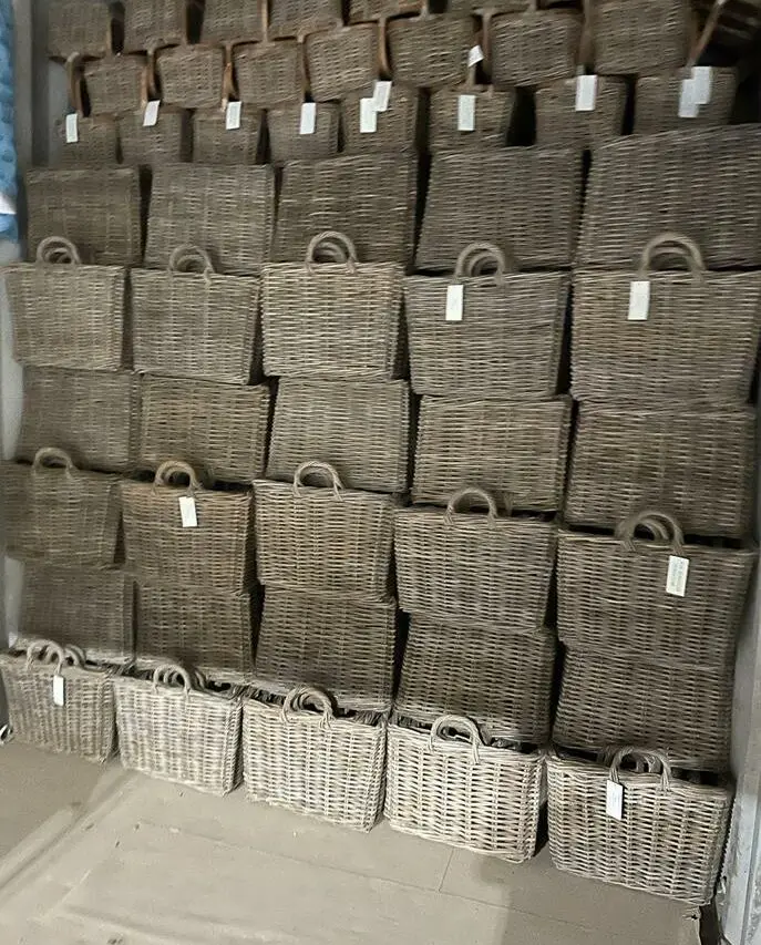 Stack of wicker / rattan baskets ready for fast delivery
